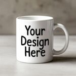 Blank white ceramic mug mockup with “Your Design Here” text – perfect template for personalized photo, logo, or custom printed mug preview